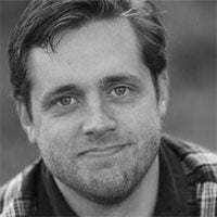 Brook Riggio headshot.